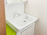 洗面リフォーム鏡の中にスッキリ収納できる、便利な洗面台